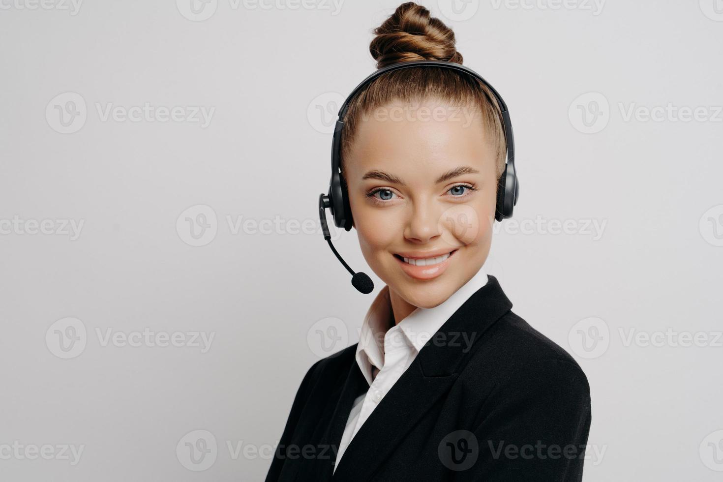 Happy businesswoman during online video call in office photo