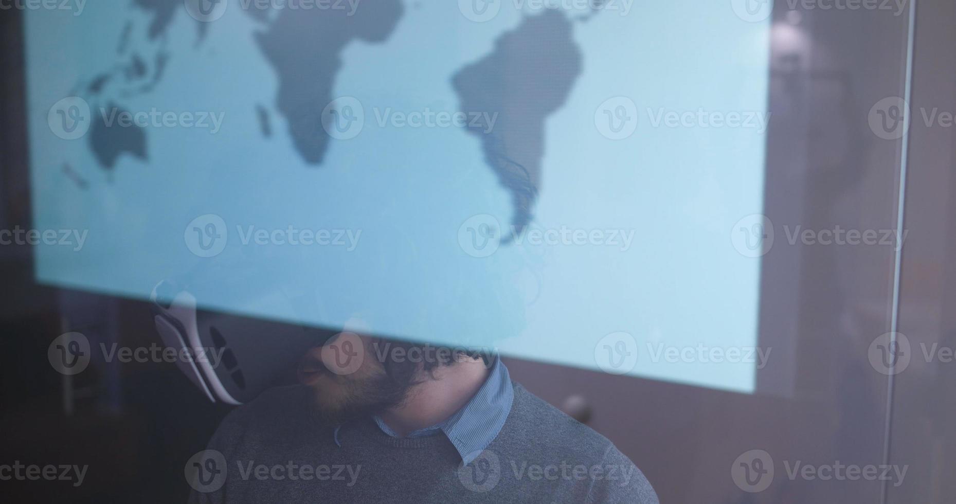 man using VR-headset glasses of virtual reality photo