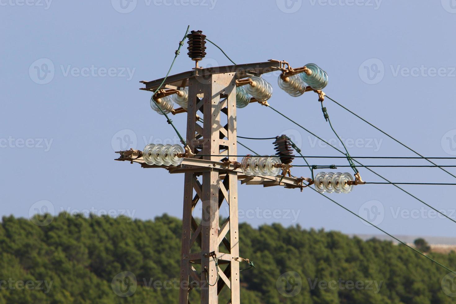 Electrical wires carrying high voltage current. photo