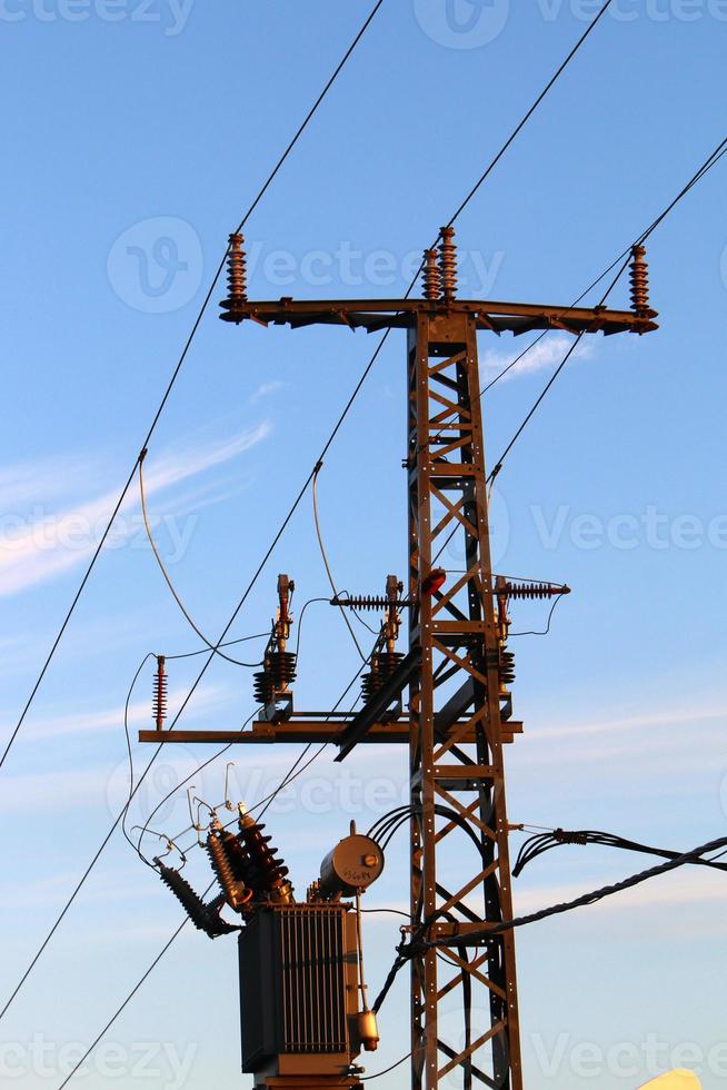 Electrical wires carrying high voltage current. photo