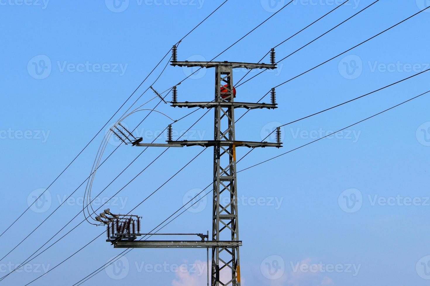 Electrical wires carrying high voltage current. photo