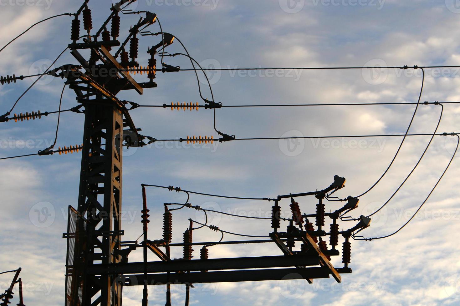 Electrical wires carrying high voltage current. photo