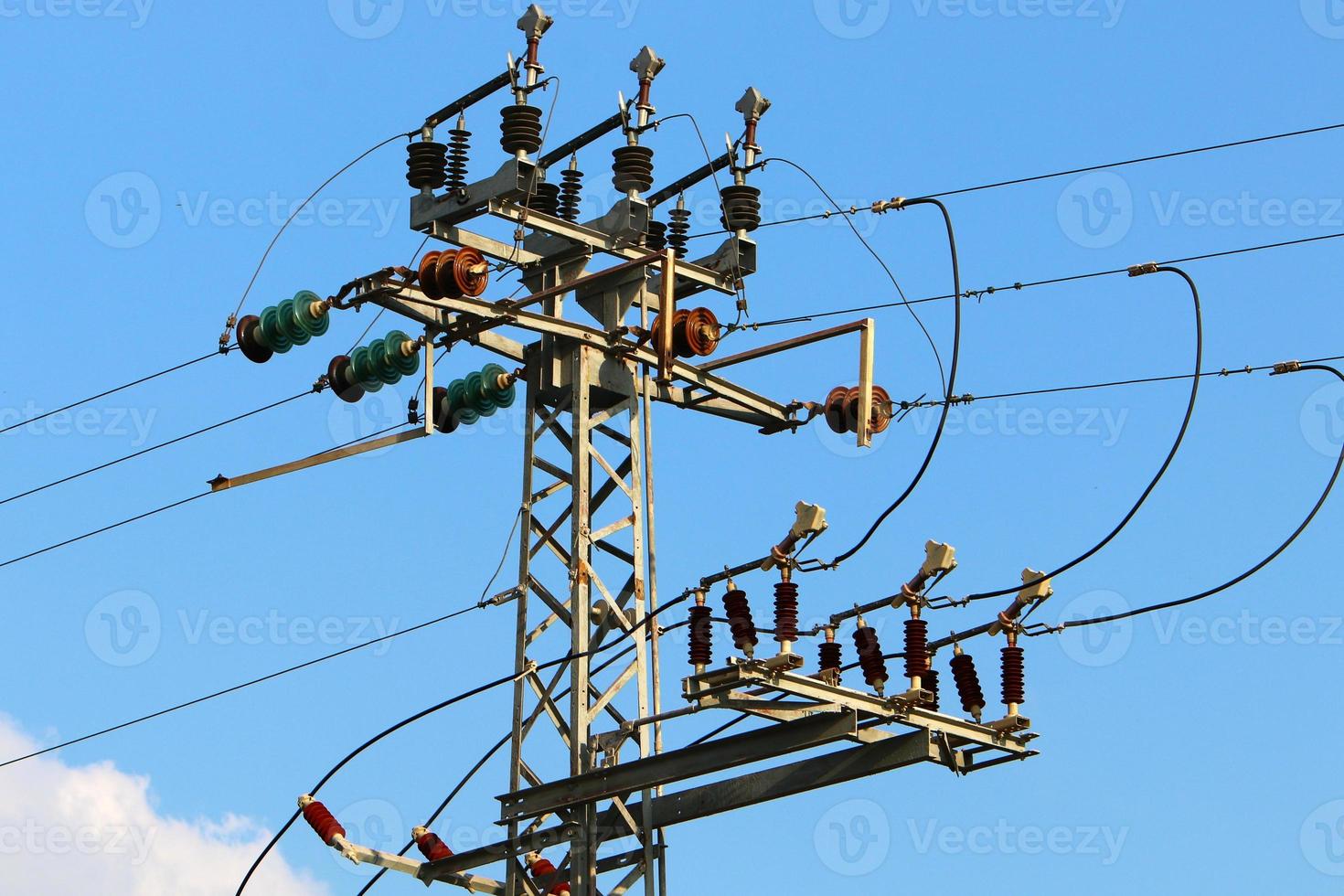 Electrical wires carrying high voltage current. photo