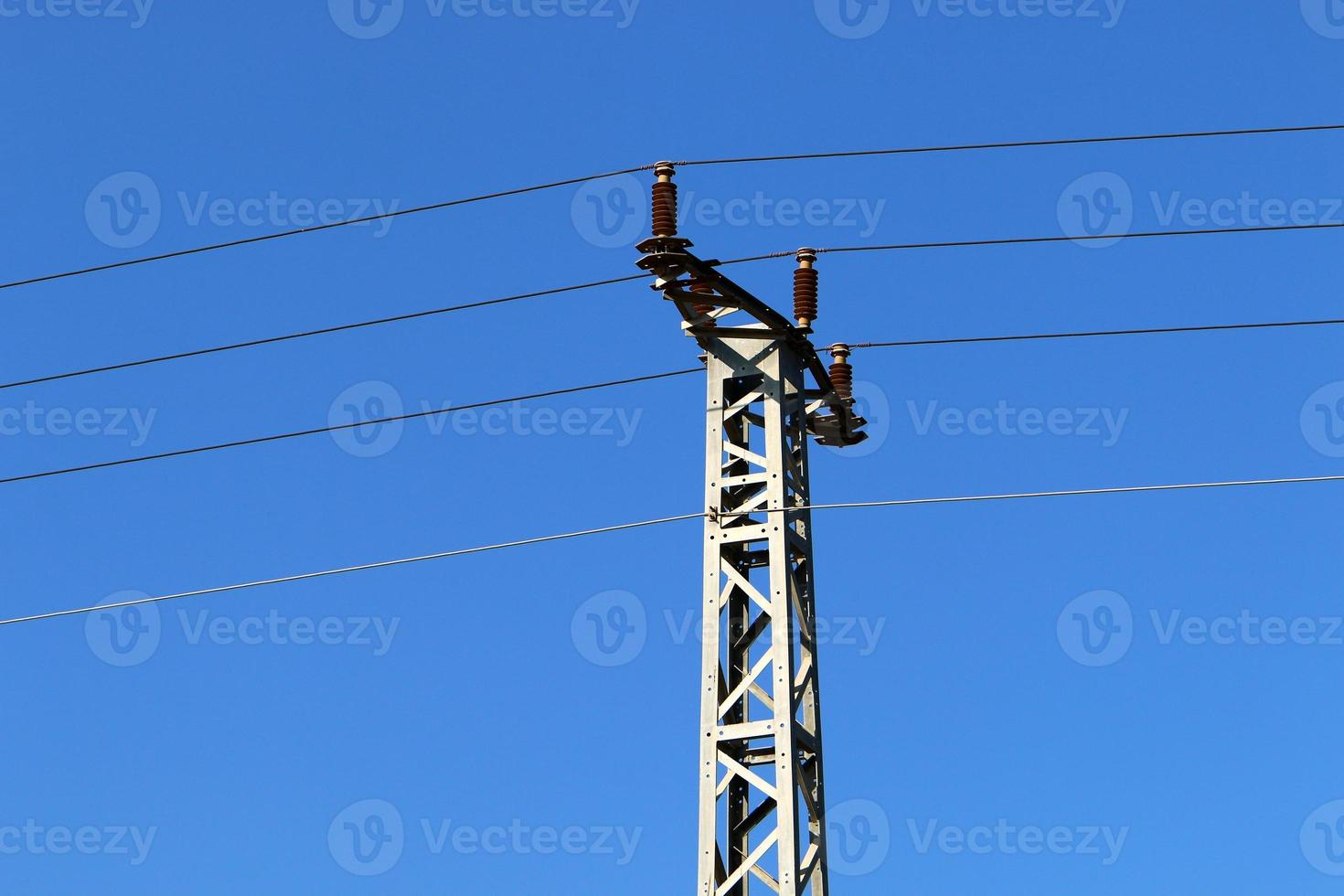 Electrical wires carrying high voltage current. photo