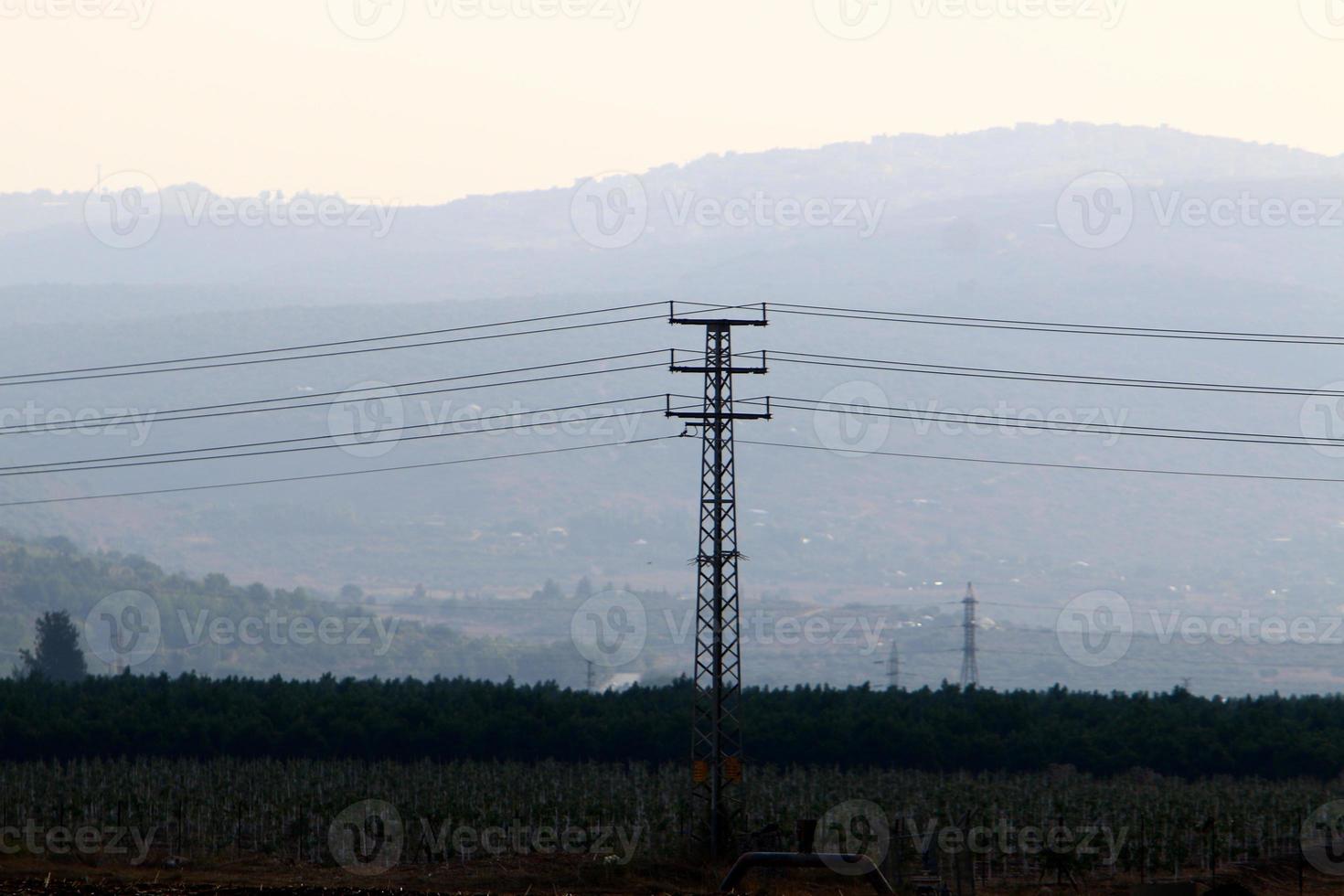 Electrical wires carrying high voltage current. photo