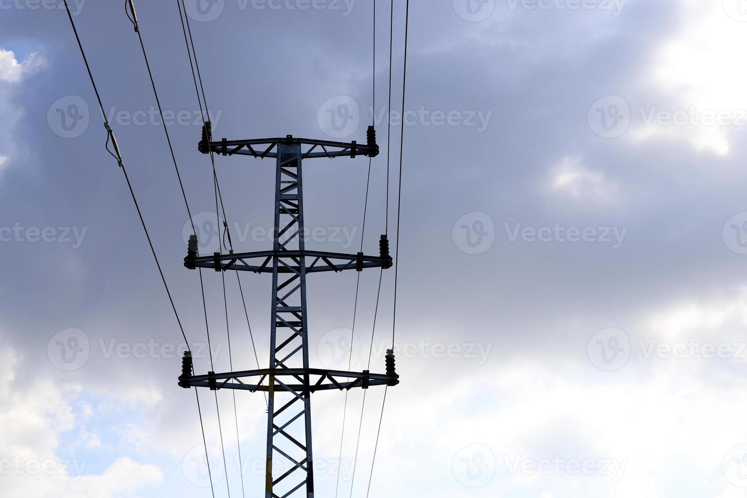 Electrical wires carrying high voltage current. photo