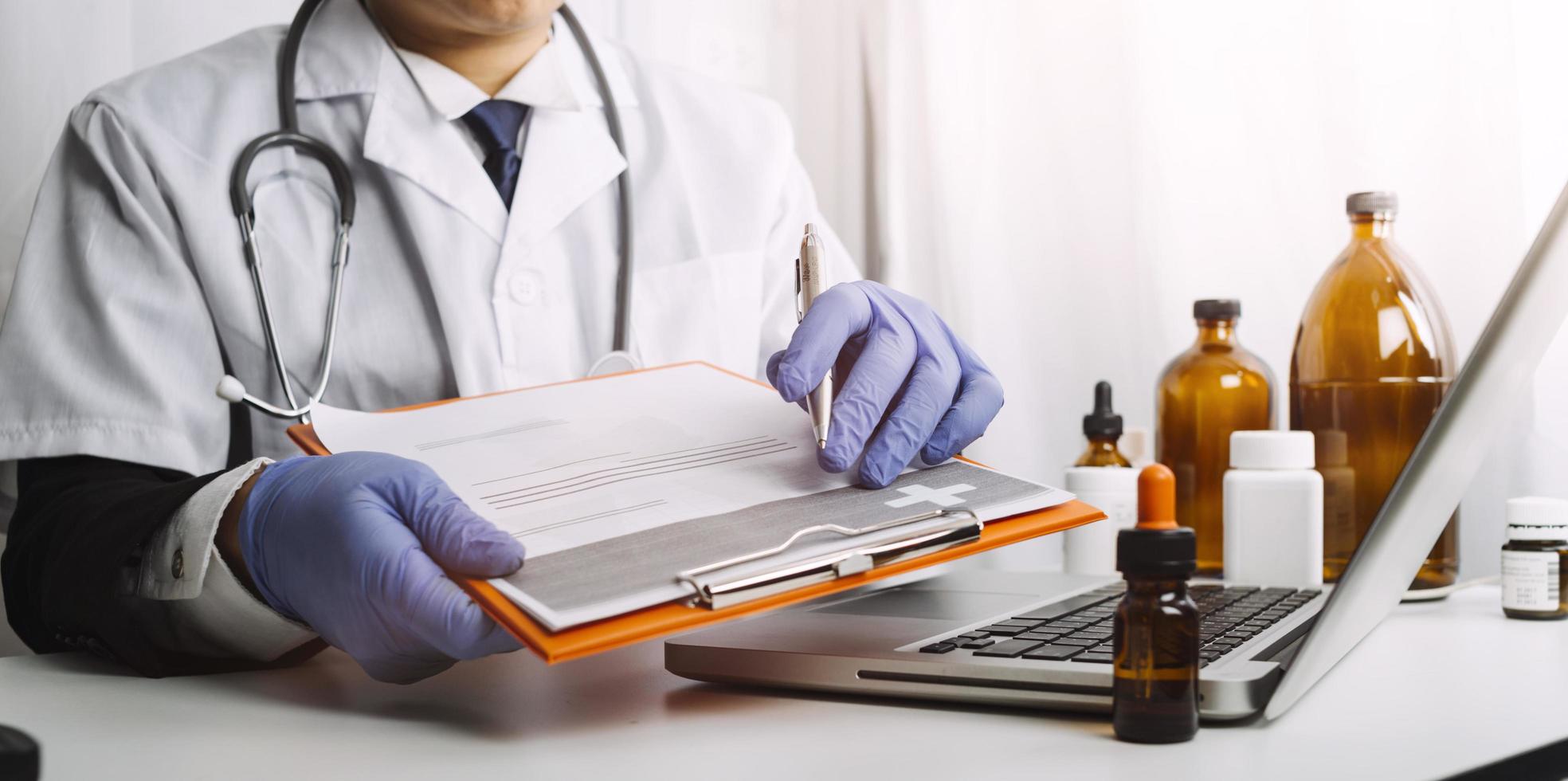 Medicine doctor and stethoscope touching icon medical network connection with modern interface on digital tablet in hospital background. Medical technology network concept photo