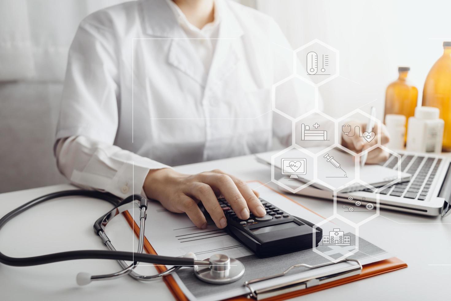 Medicine doctor and stethoscope touching icon medical network connection with modern interface on digital tablet in hospital background. Medical technology network concept photo