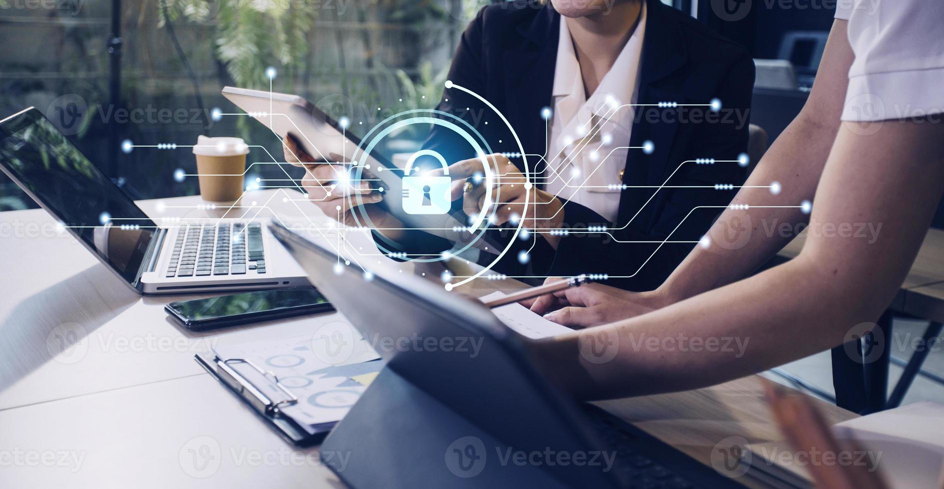 Cybersecurity and privacy concepts to protect data. Lock icon and internet network security technology. Businessman protecting personal data on smart phone with virtual screen interfaces. photo
