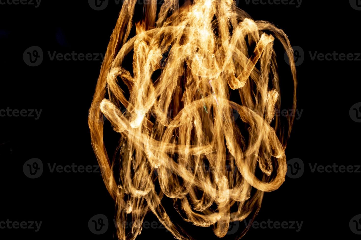 Line of fire in dark. Flame texture. photo