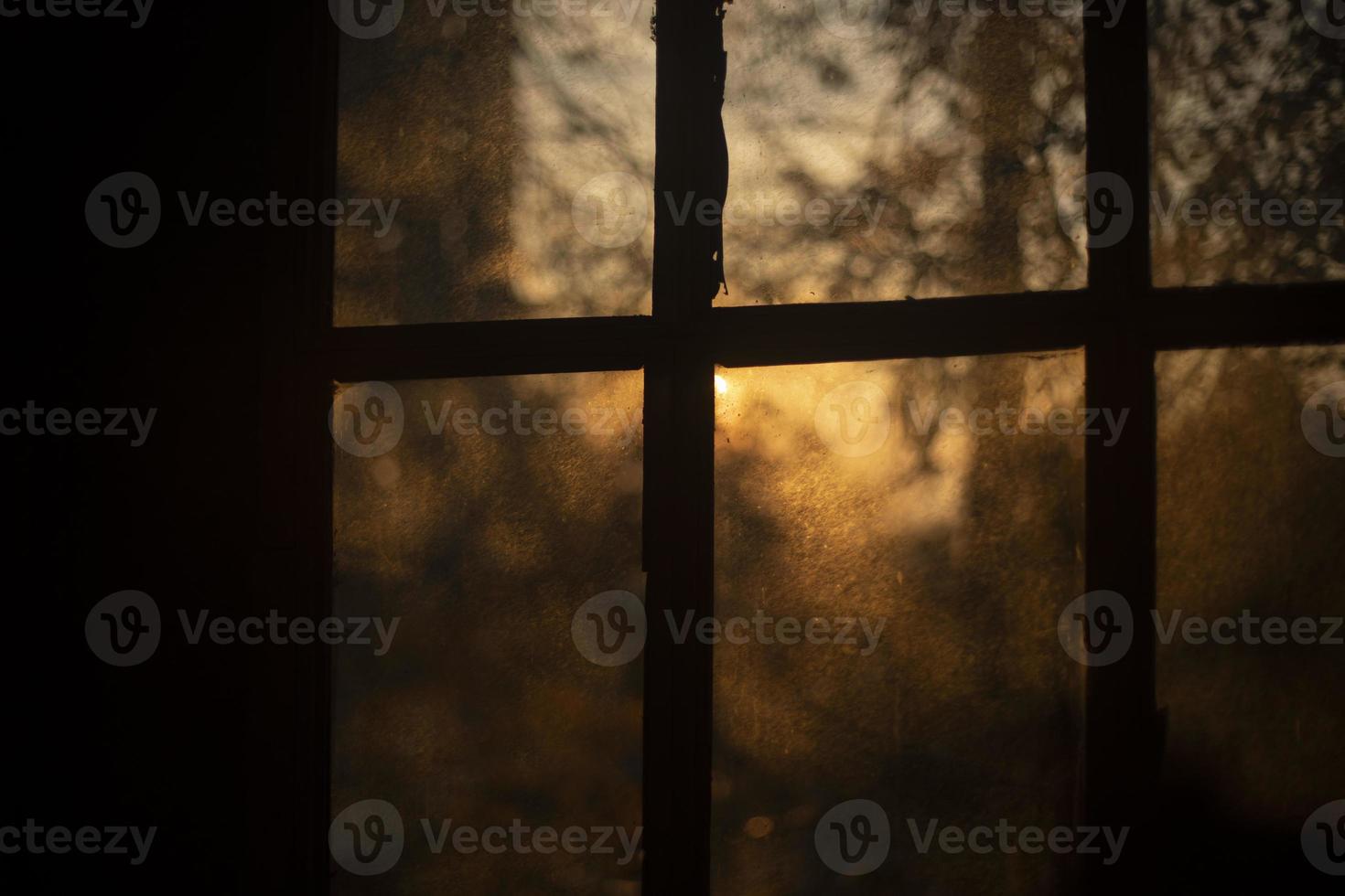 Window at dawn. Balcony in the sunlight. photo