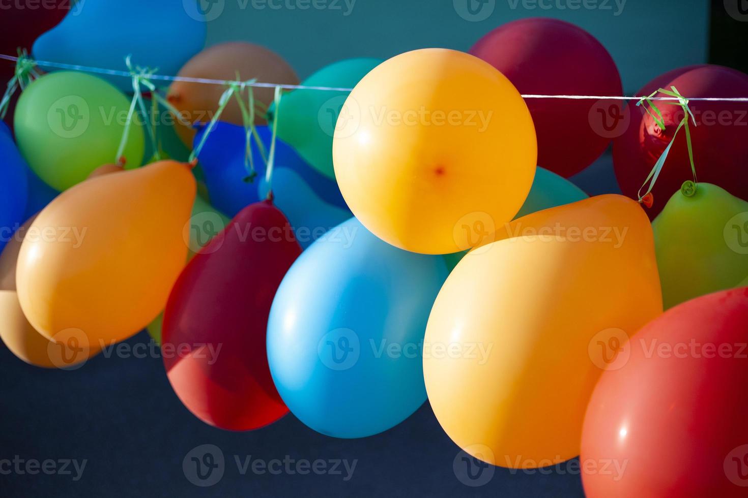 Balloons on the street. Colored balls with helium. Decoration of the holiday. photo