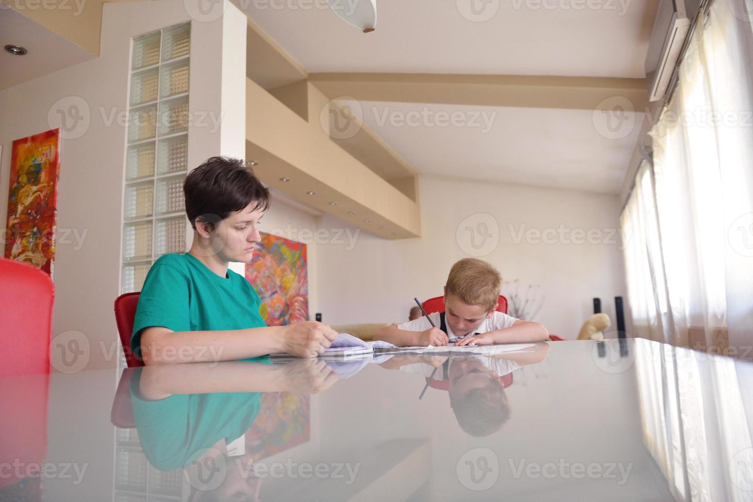 Boy doing homework photo