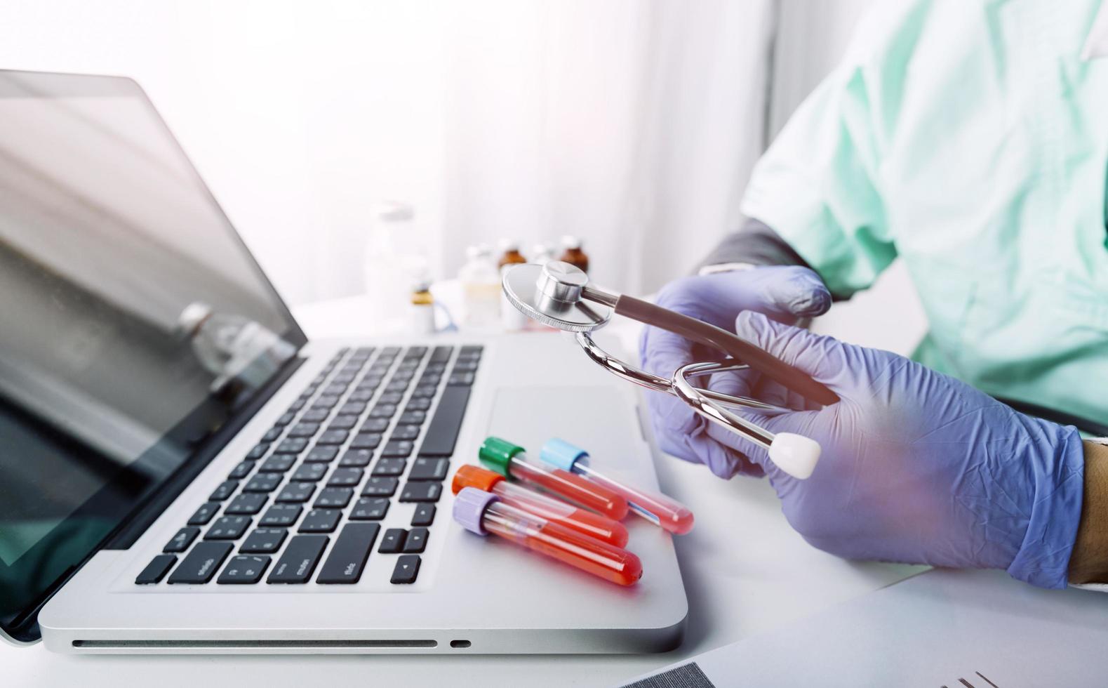 Medicine doctor and stethoscope touching icon medical network connection with modern interface on digital tablet in hospital background. Medical technology network concept photo