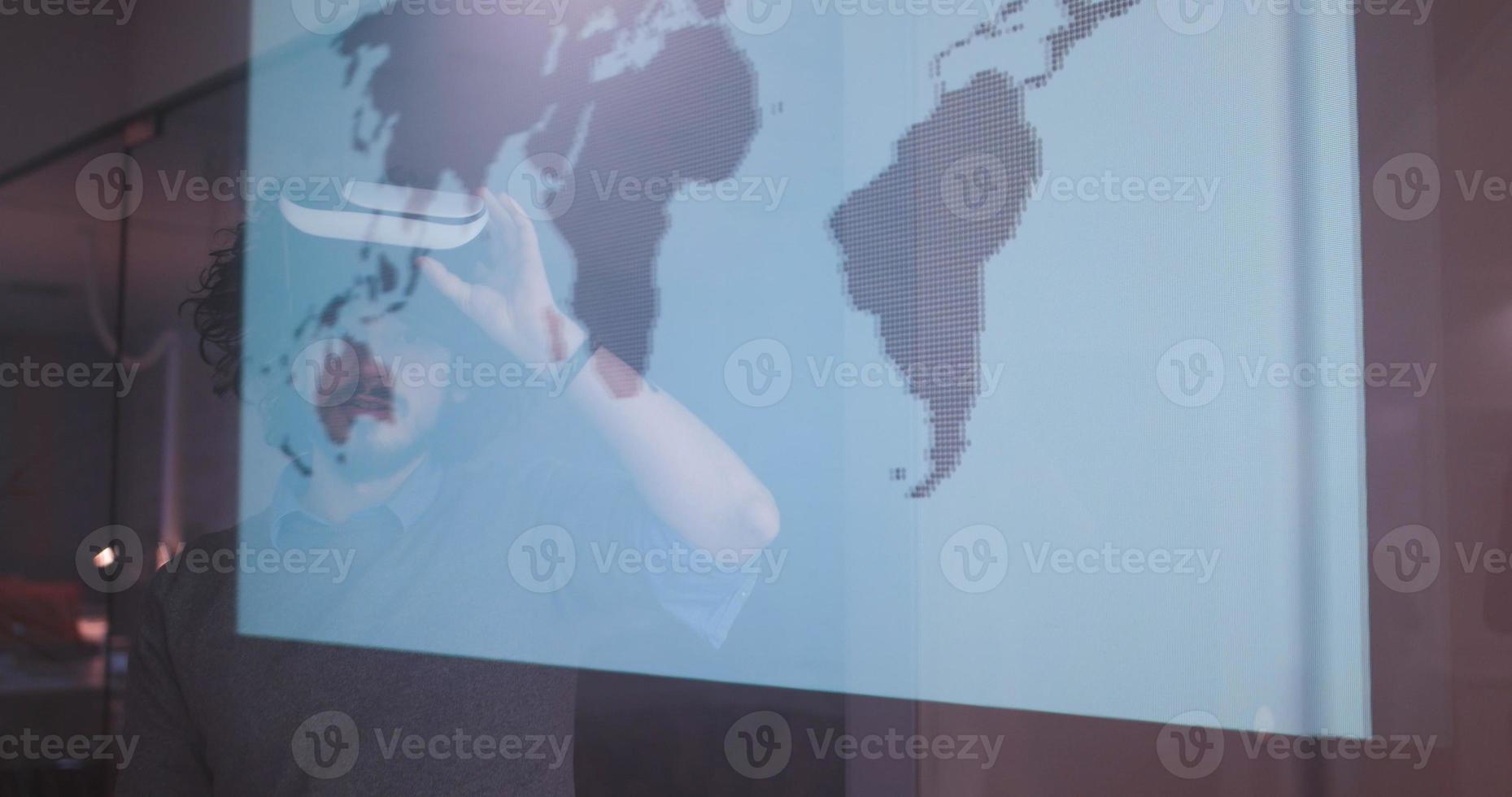 man using VR-headset glasses of virtual reality photo
