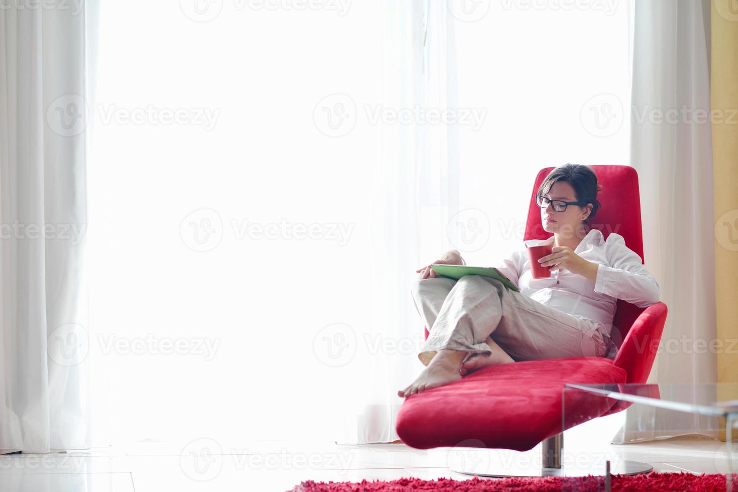 woman using tablet pc at home photo