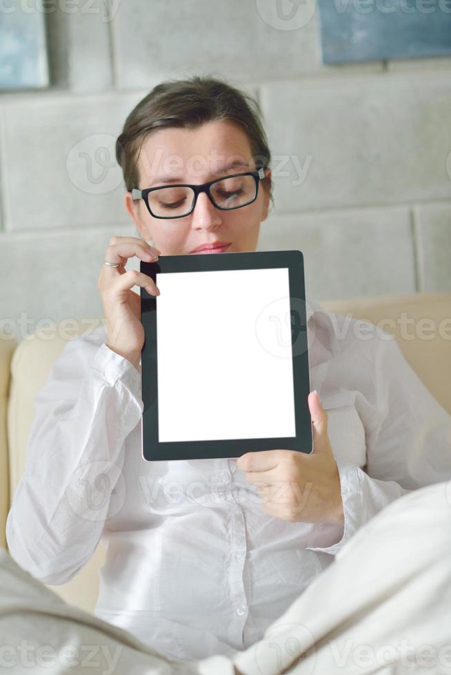 woman using tablet pc at home photo