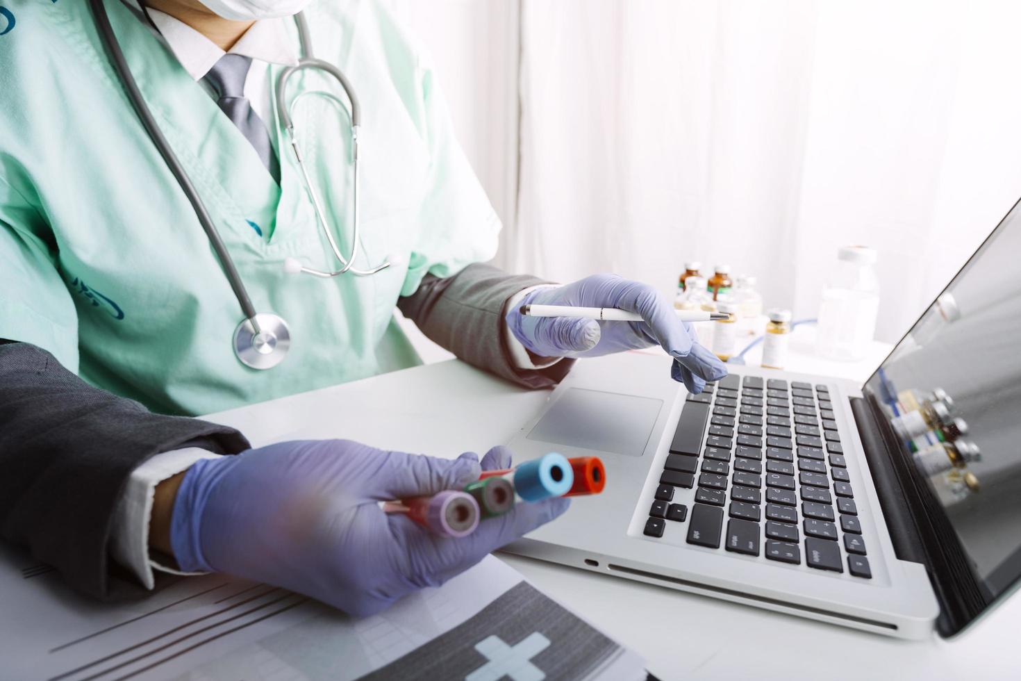 Medicine doctor and stethoscope touching icon medical network connection with modern interface on digital tablet in hospital background. Medical technology network concept photo
