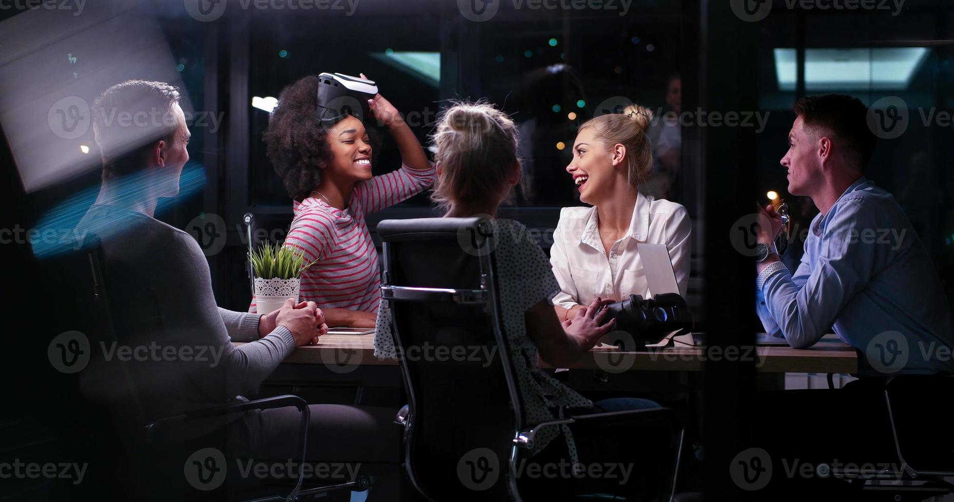 Multiethnic Business team using virtual reality headset photo
