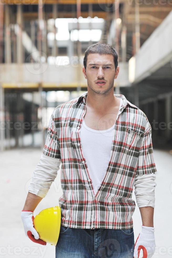 hard worker on construction site photo