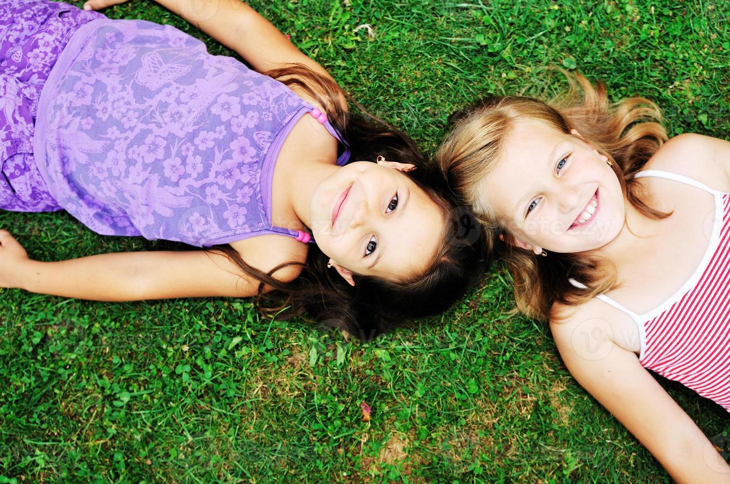 two happy girls have fun outdoor photo