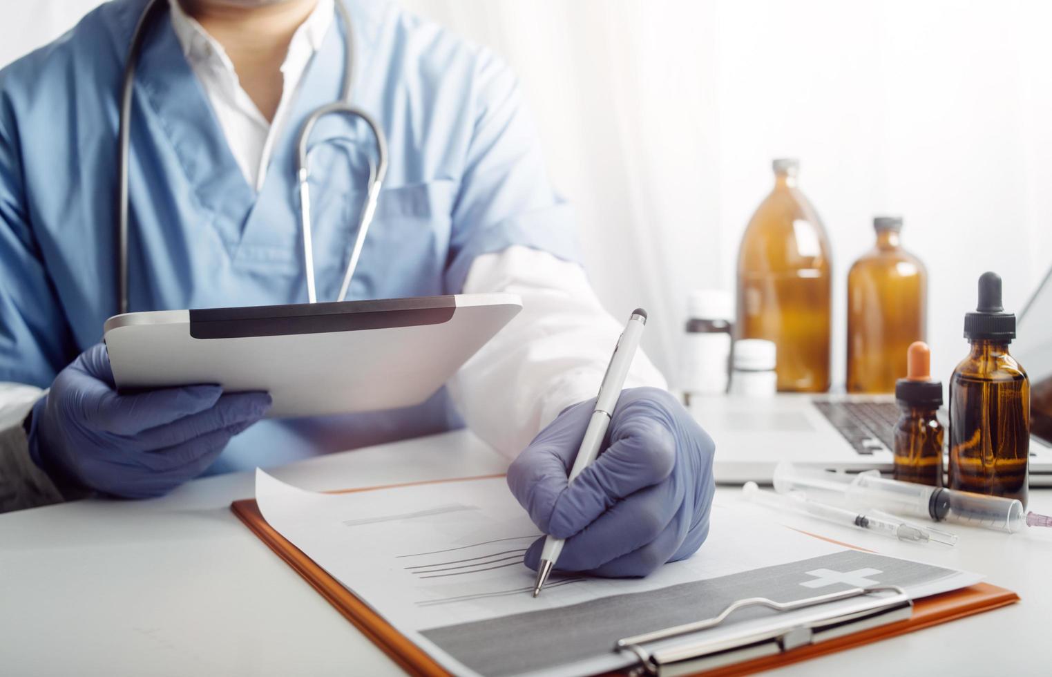 Medicine doctor and stethoscope touching icon medical network connection with modern interface on digital tablet in hospital background. Medical technology network concept photo