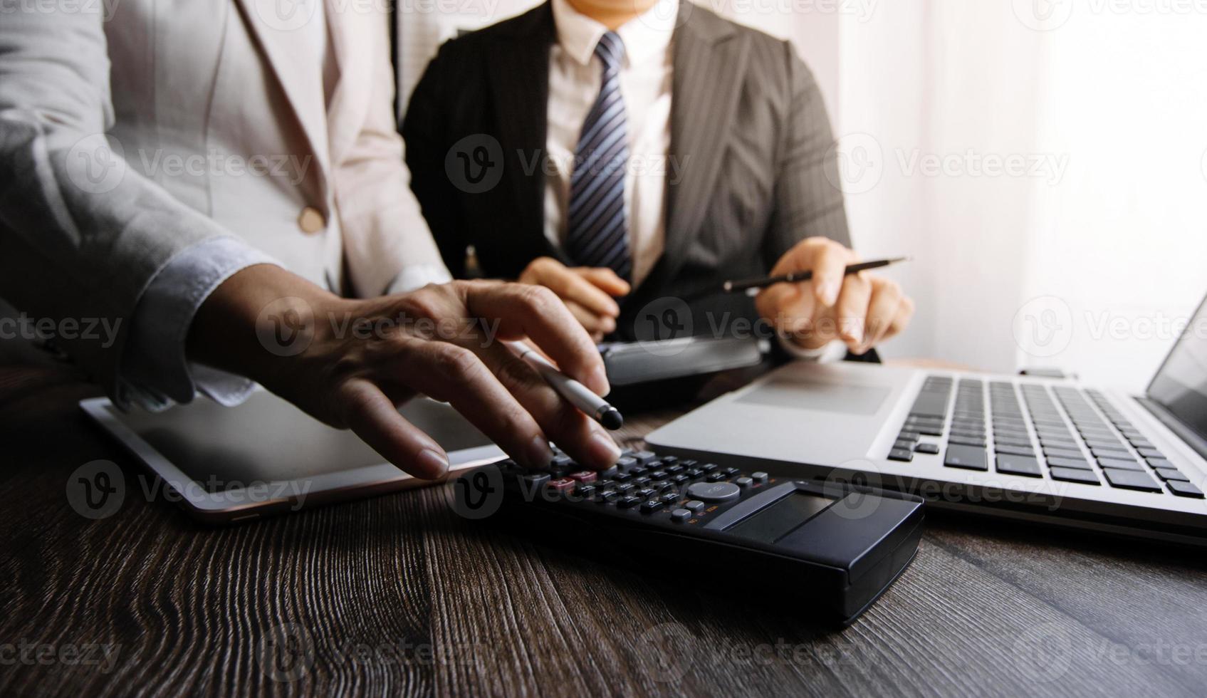 Business People Meeting to analyse and discuss and brainstorming the financial report chart data in office Financial advisor teamwork and accounting concept. photo