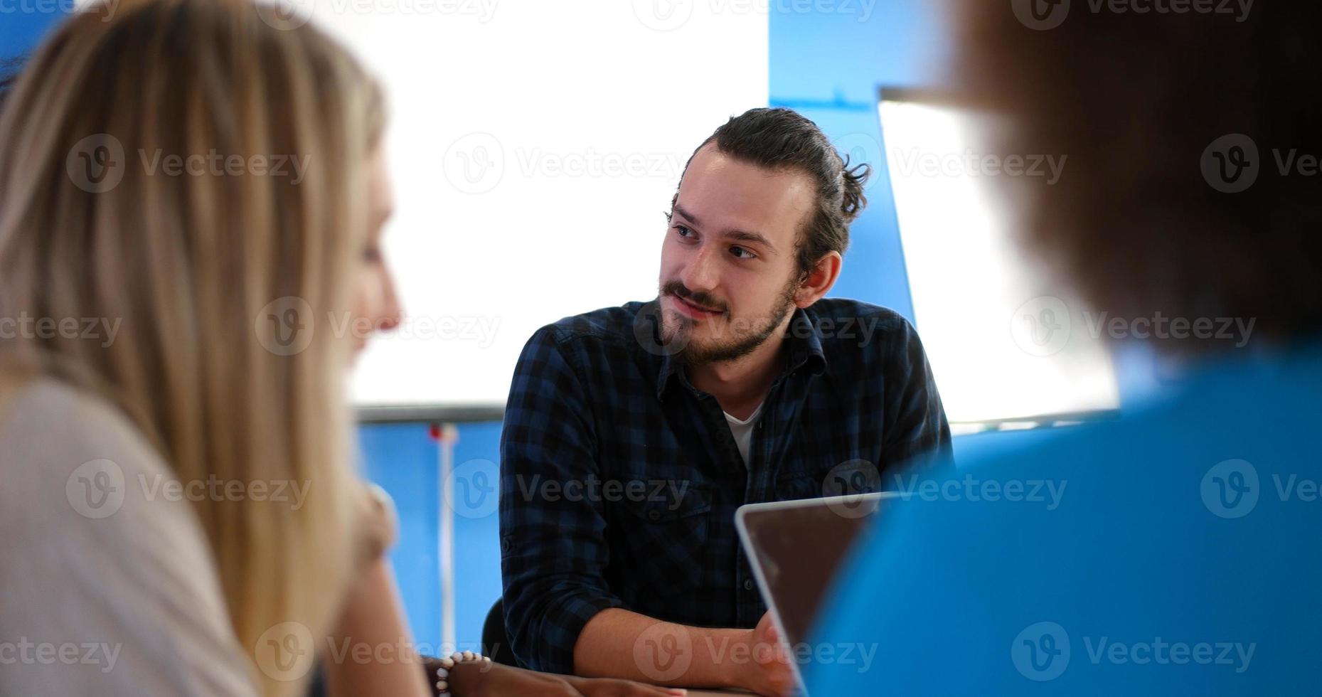 Multiethnic startup Business Team At A Meeting at modern office building photo