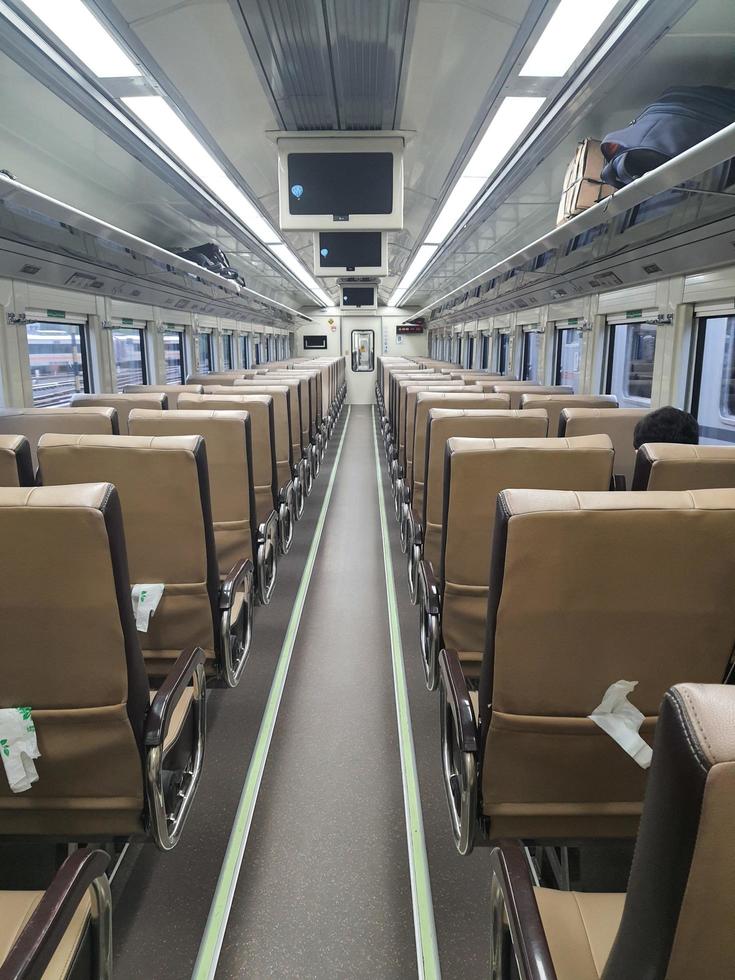 Premium economy class train passenger seats in Indonesia. photo