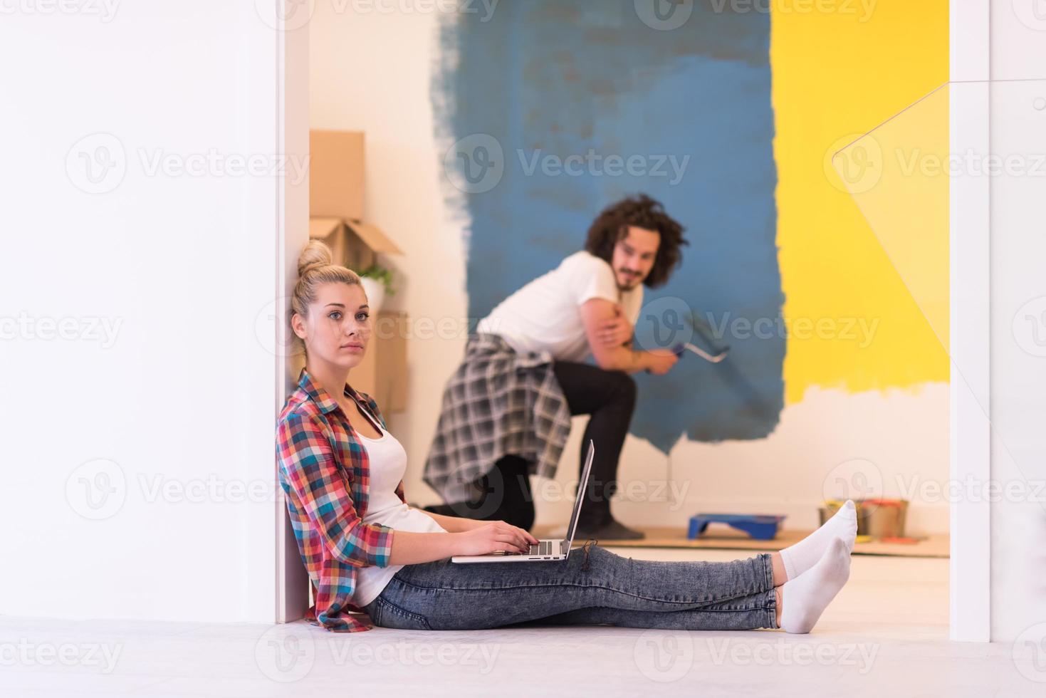 Happy couple doing home renovations photo