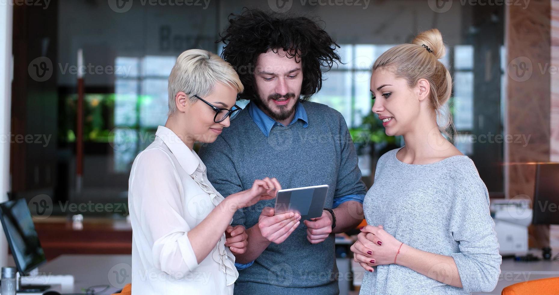 Startup Business Team At A Meeting at modern office building photo