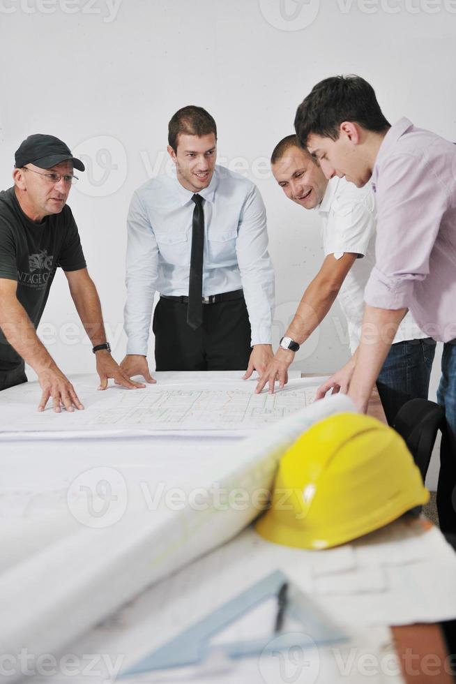 Team of architects on construciton site photo