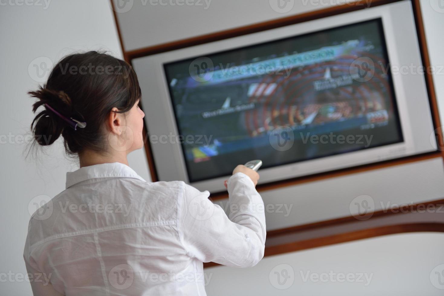 happy young woman relax at home on sofa photo