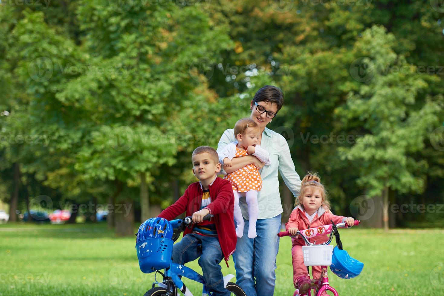 happy young family in park photo