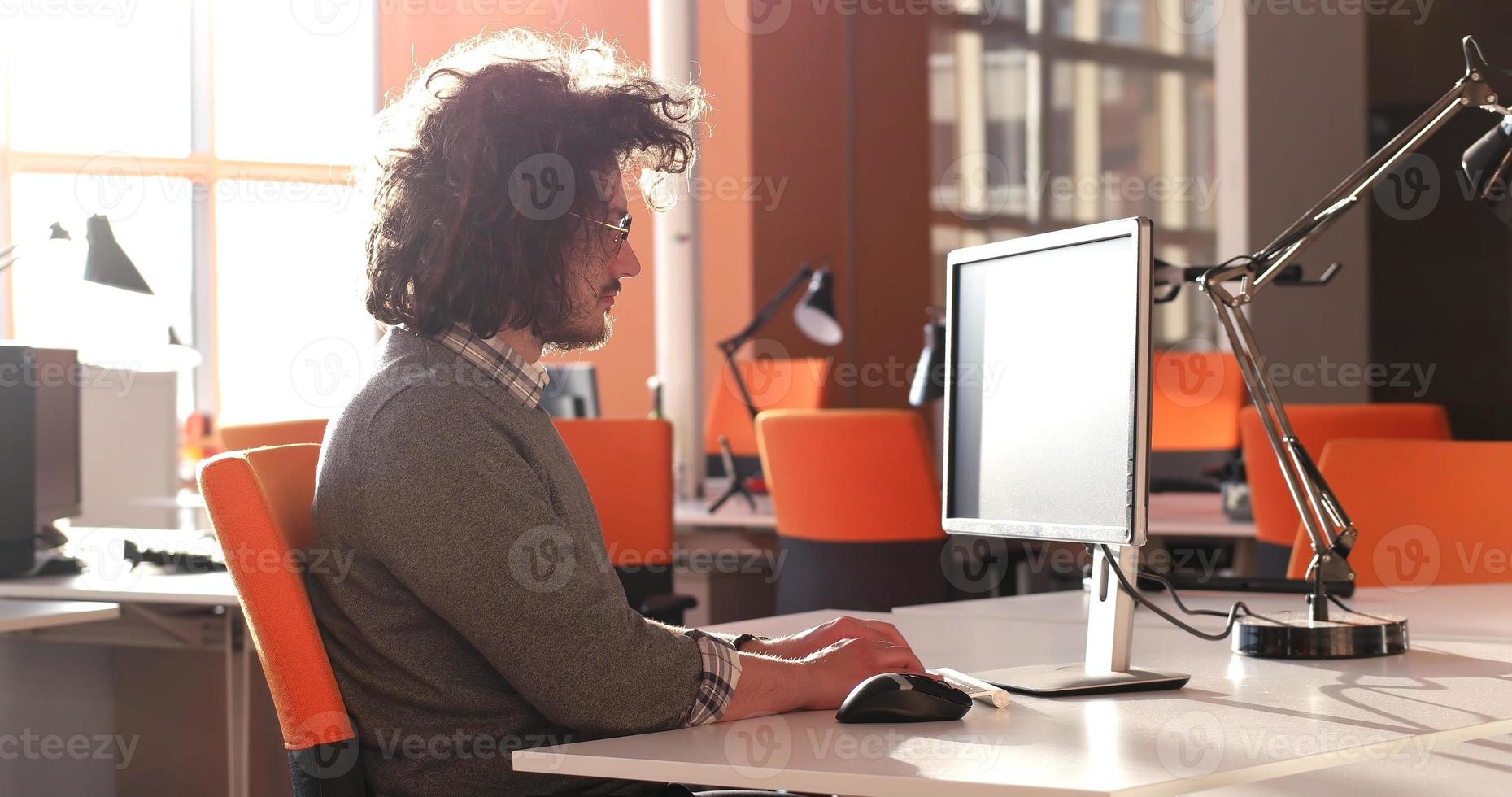 businessman working using a computer in startup office photo