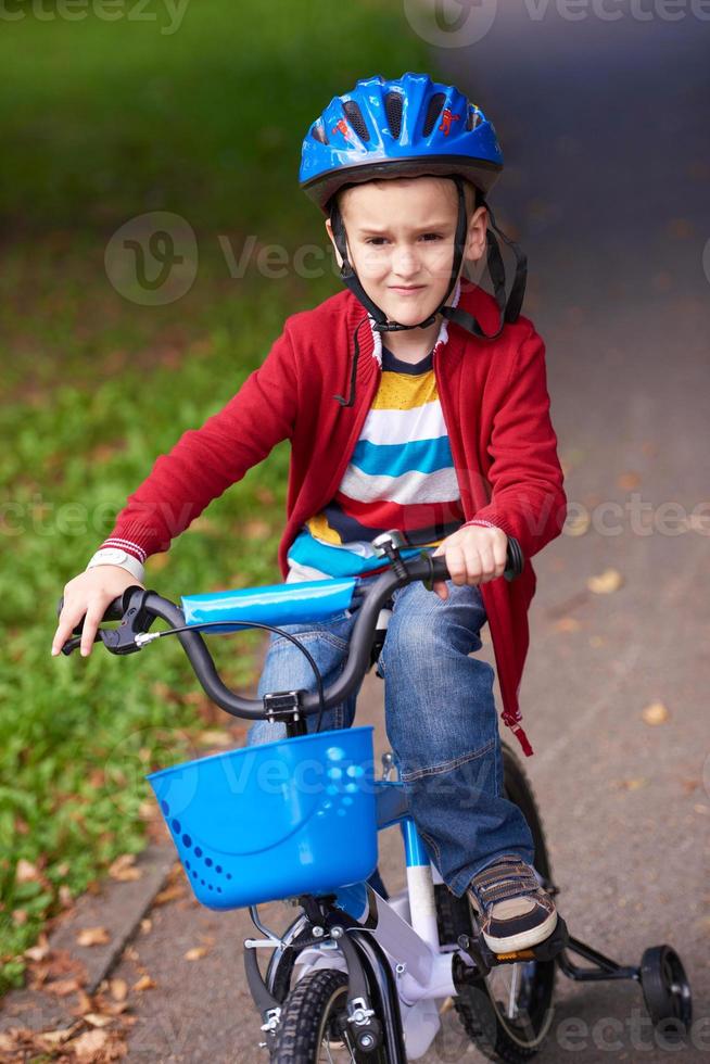 boy on the bicycle at Park photo