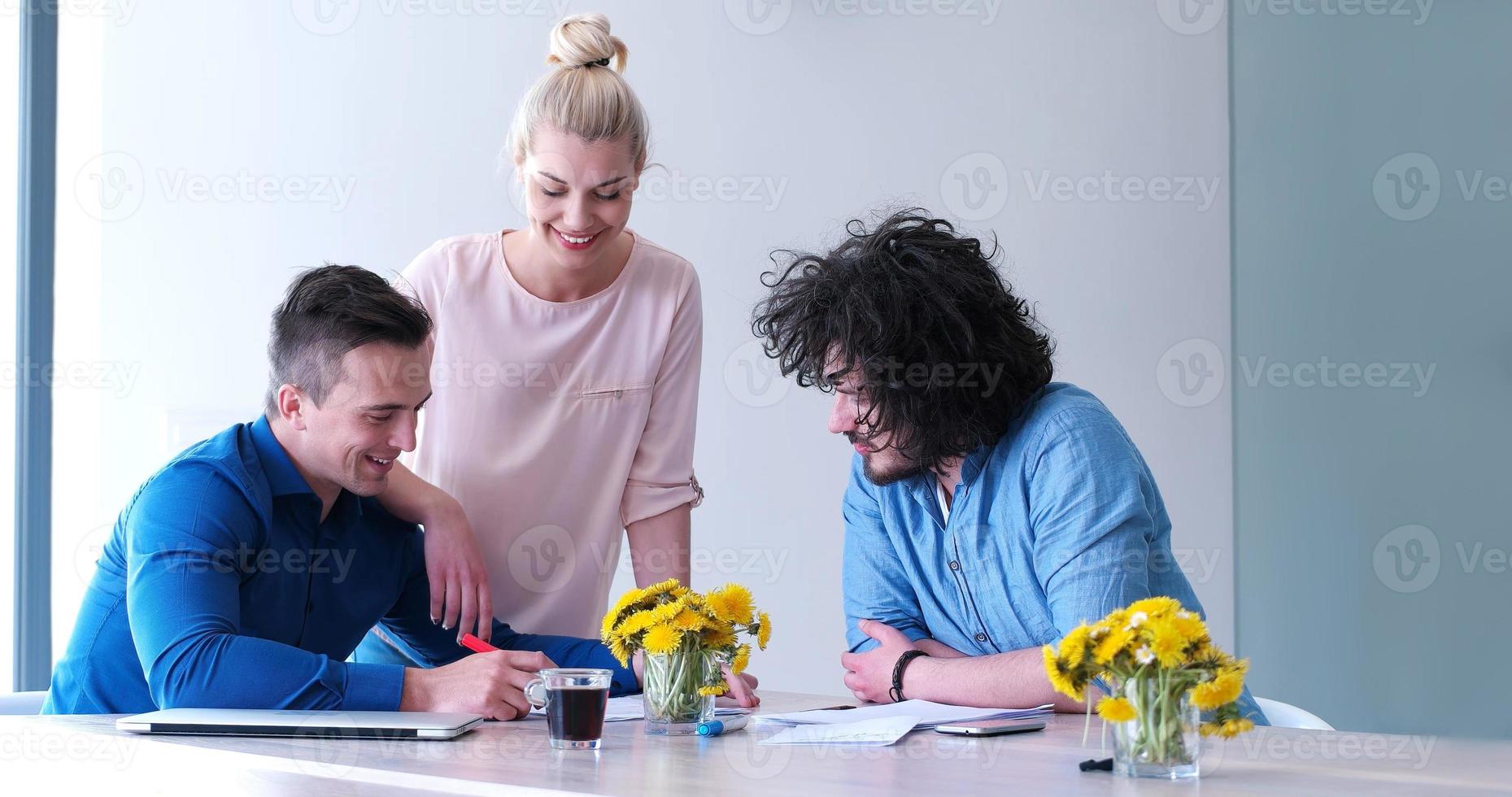 Startup Business Team At A Meeting at modern office building photo