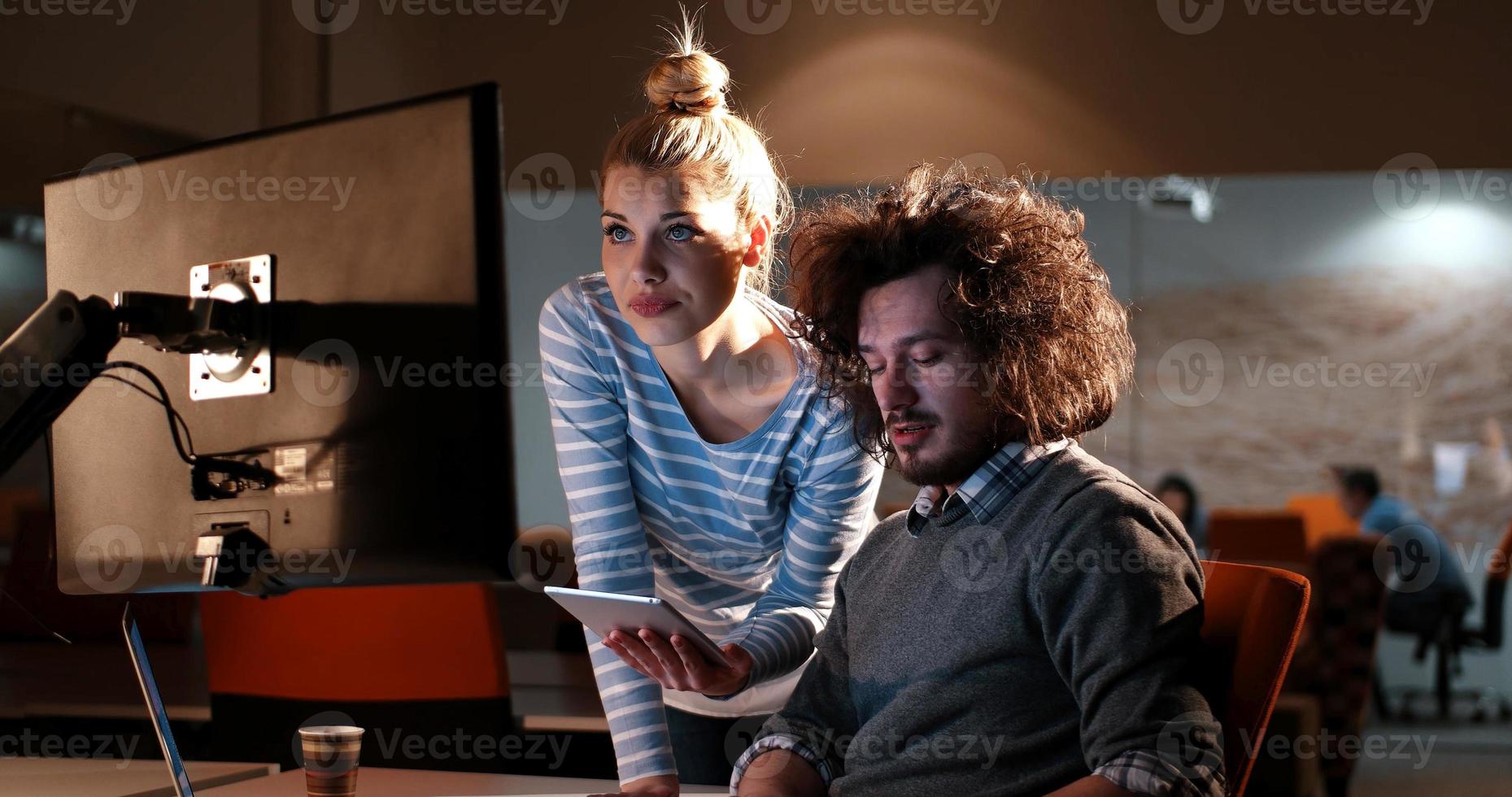 young designers in the night office photo