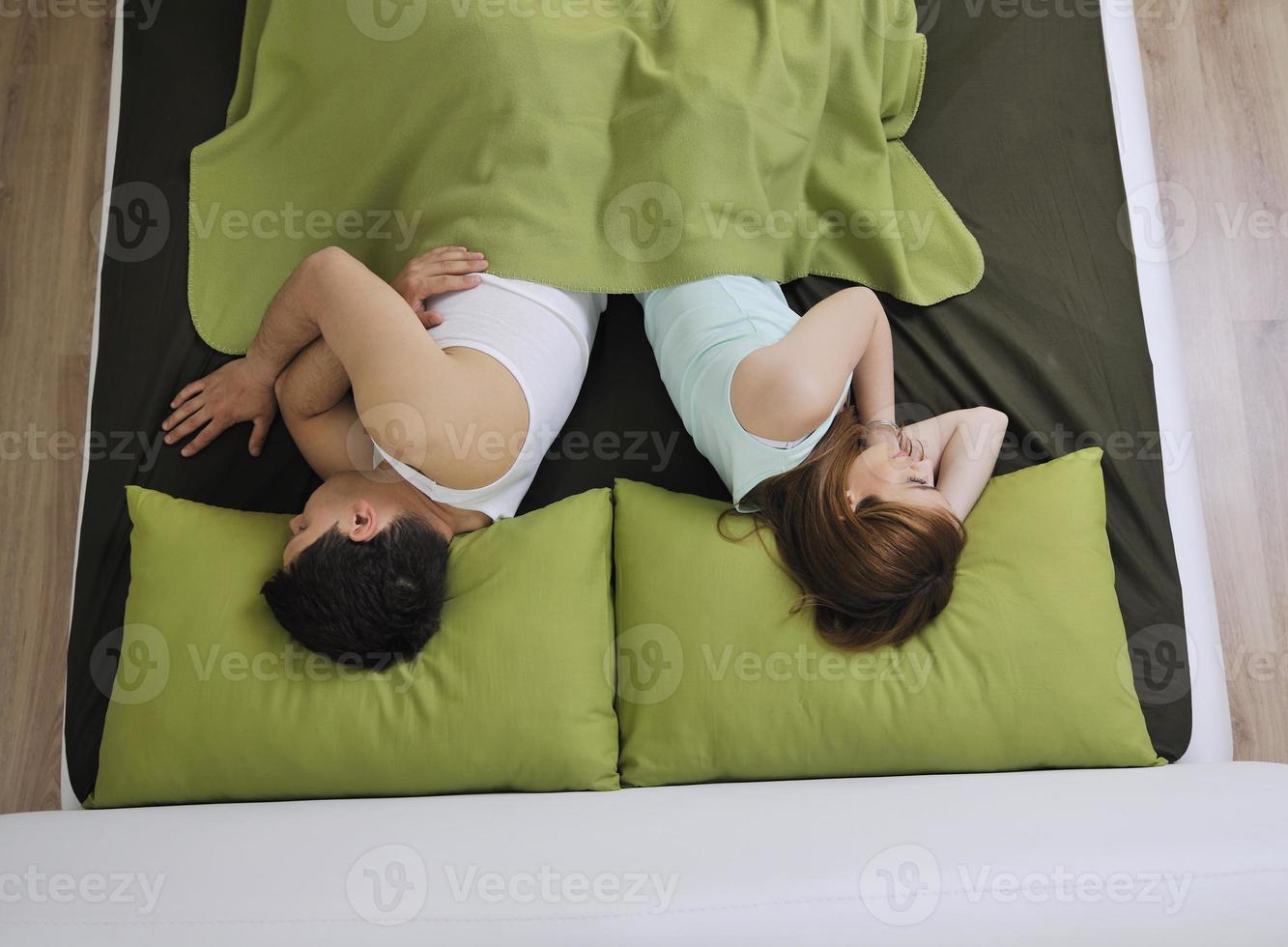 young couple in bed photo