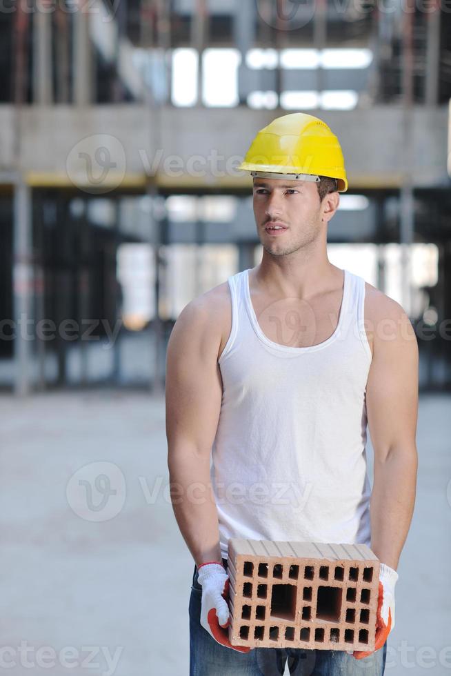 hard worker on construction site photo