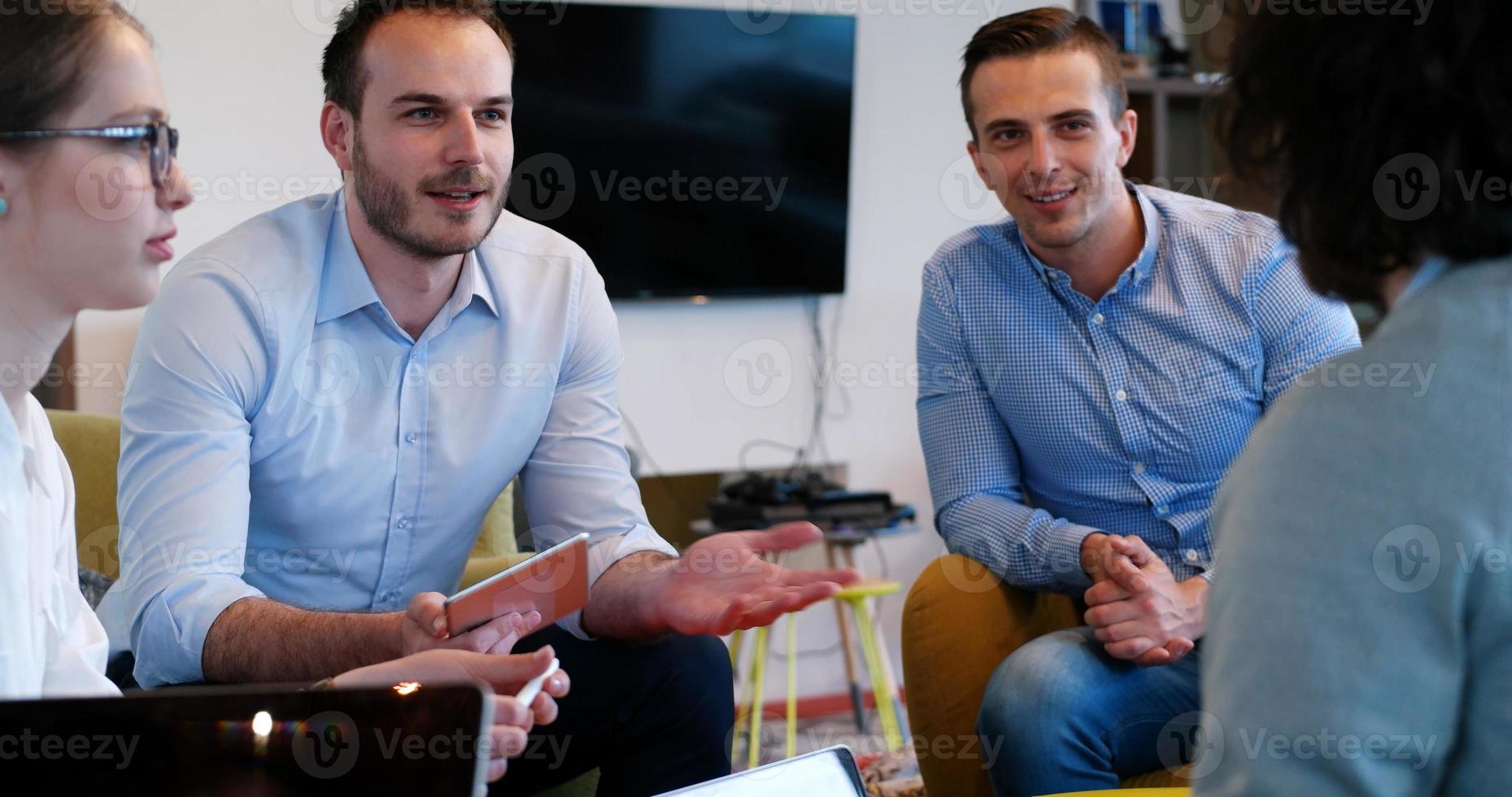 Startup Business Team At A Meeting at modern office building photo