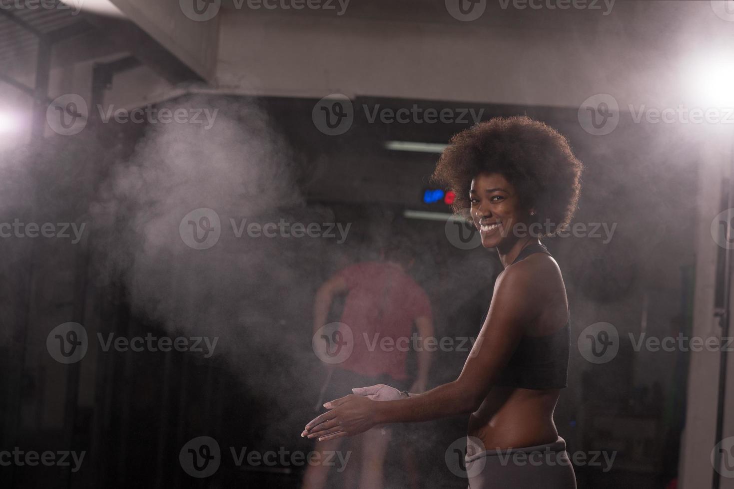 black woman preparing for climbing workout photo