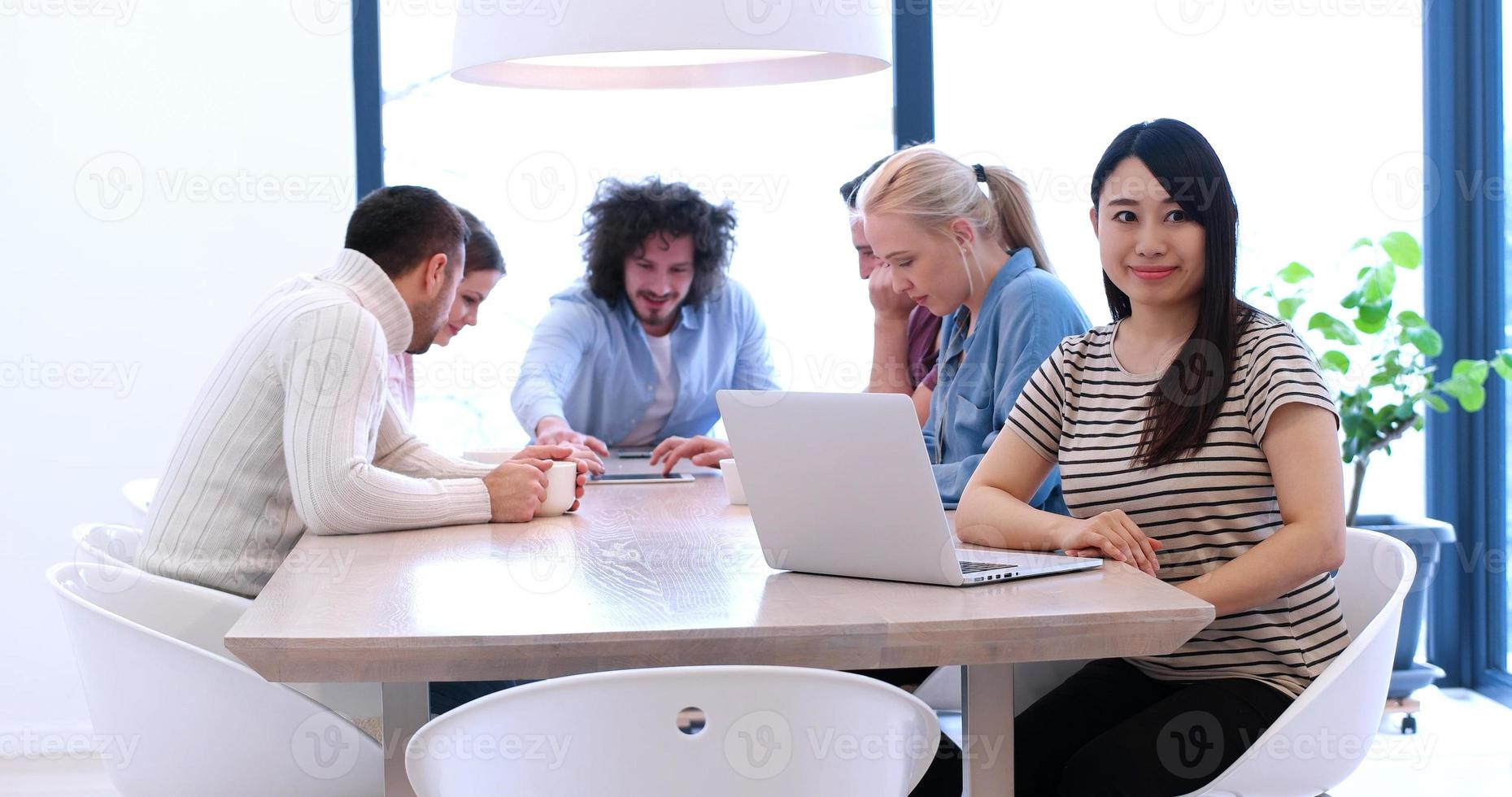 Startup Business Team At A Meeting at modern office building photo
