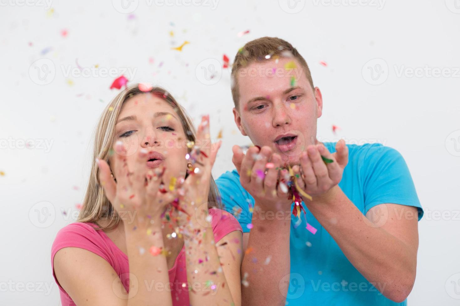 romantic young  couple celebrating  party with confetti photo