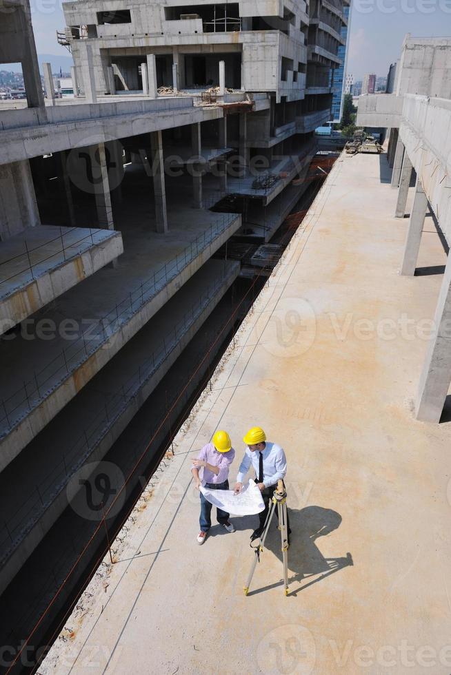 Team of architects on construciton site photo