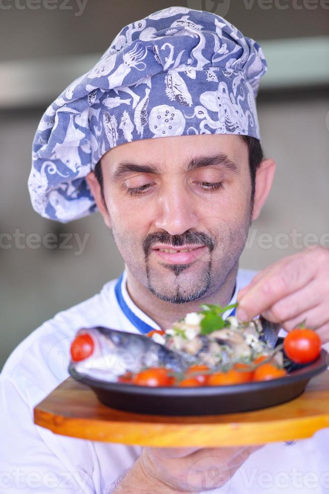 Chef in kitchen photo