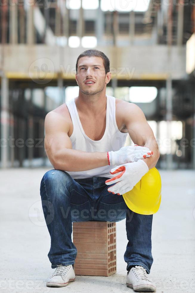 hard worker on construction site photo