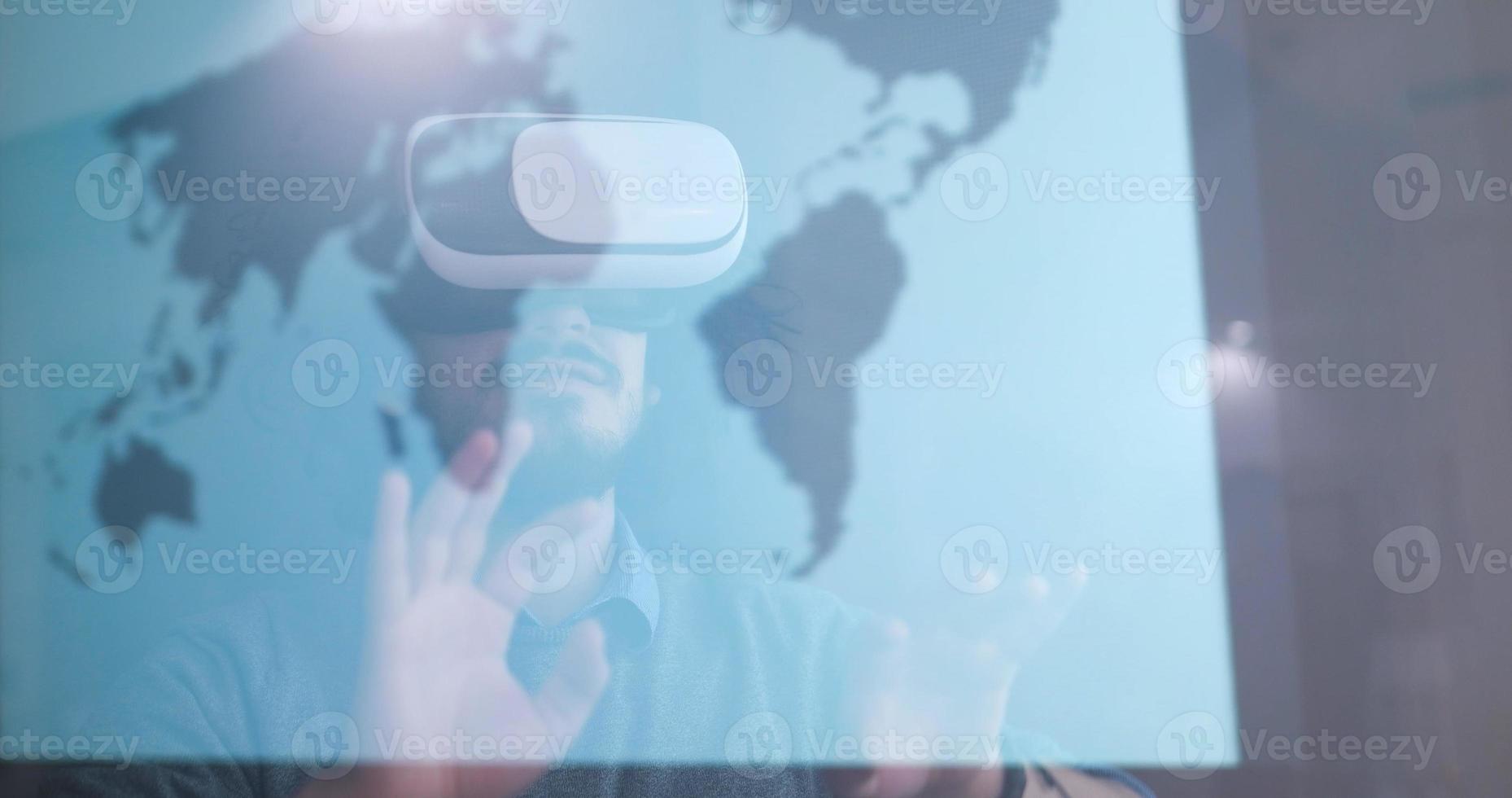 man using VR-headset glasses of virtual reality photo
