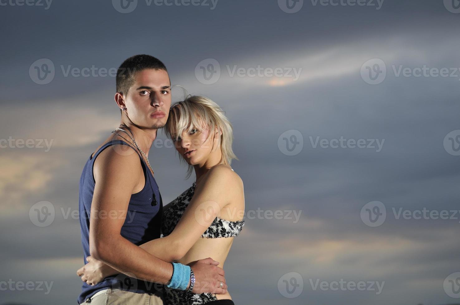 romantic urban couple dancing outdoor photo