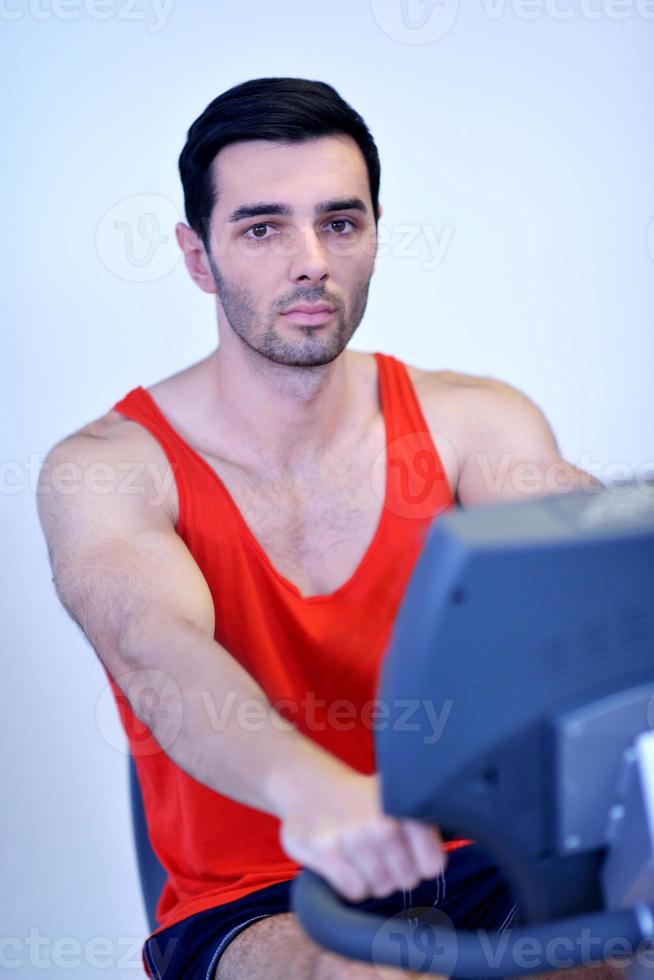 man running on the treadmill photo